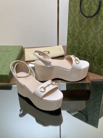 ua G*u*i women's horsebit flatform sandal