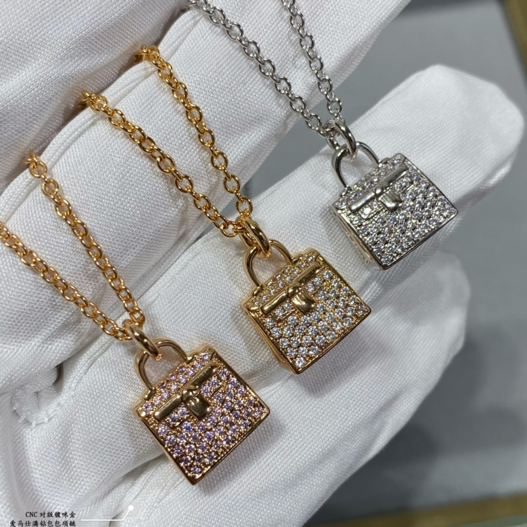 hermès fully Di*m*nd-encrusted bag necklace