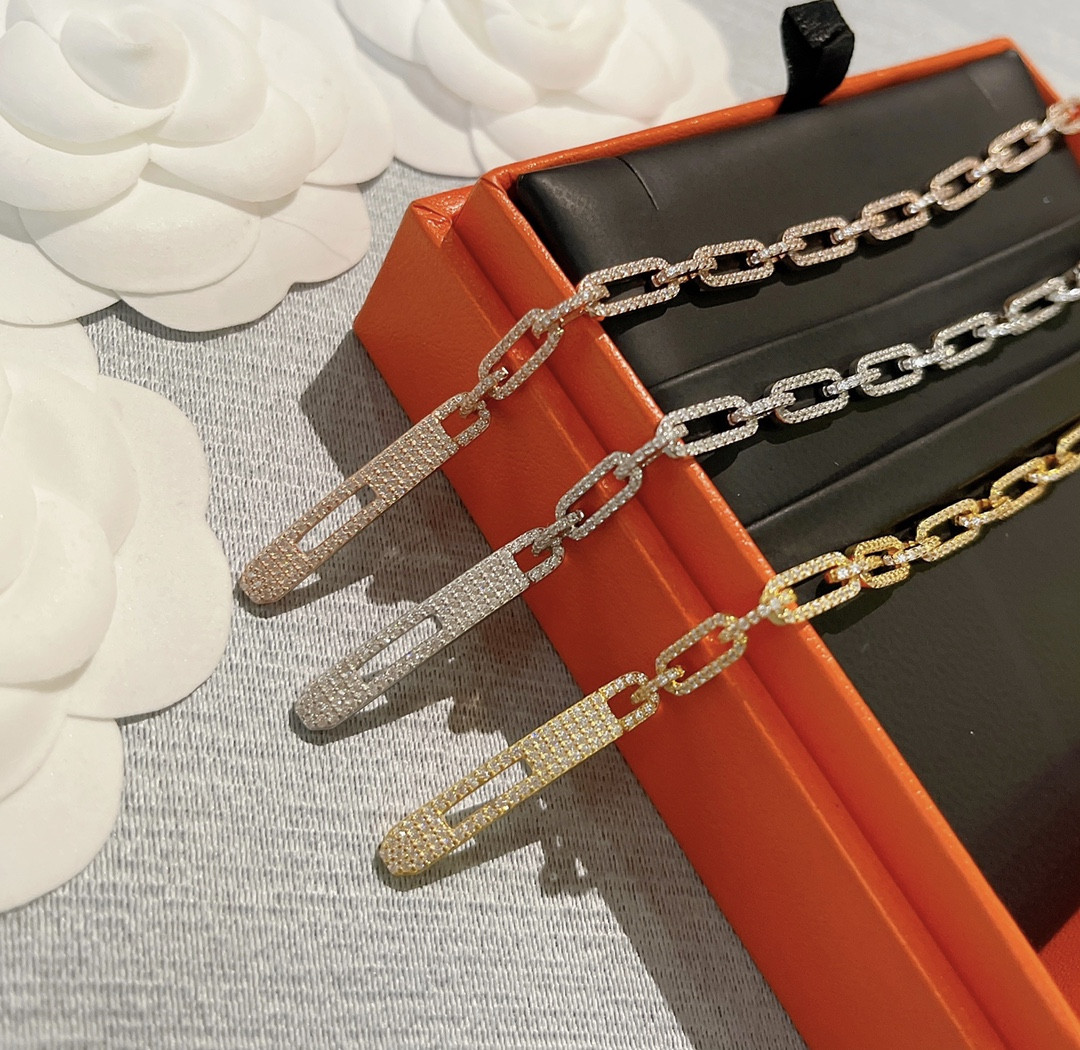 hermès fully Di*m*nd-encrusted kelly bracelet