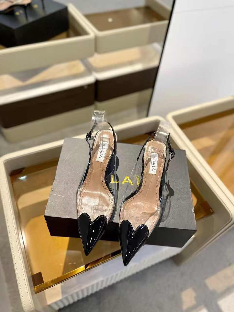 UA ALAÏA Le Coeur Plexi Heart-Toe Slingback Pump