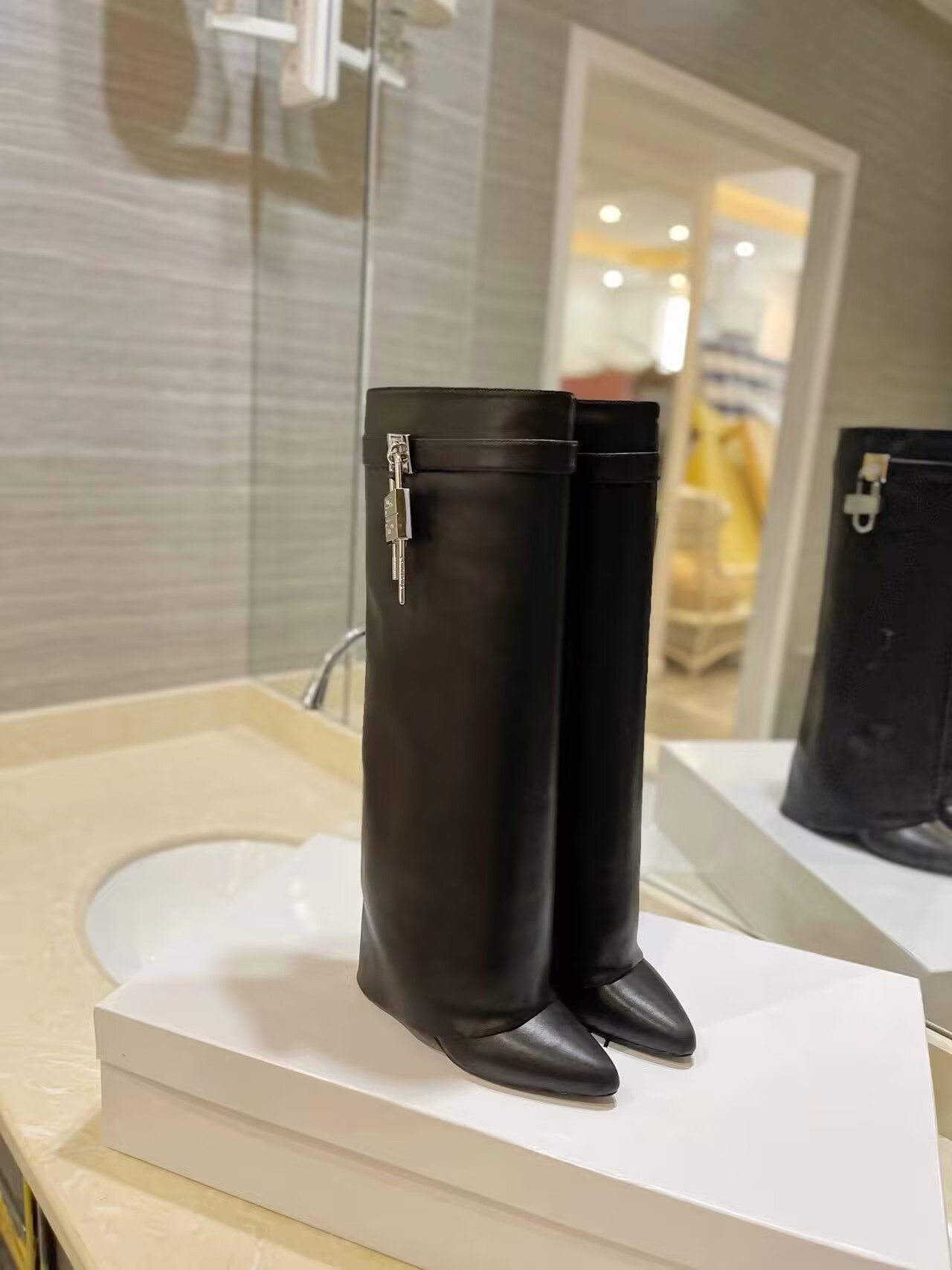 UA Givenchy Shark Lock boots in leather