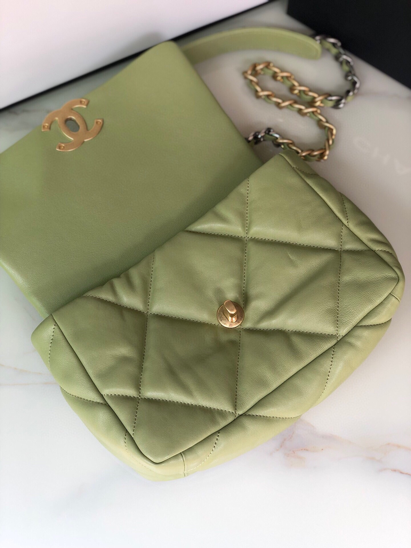 Ch*el 19 handbag shiny leather, gold-tone, silver-tone & ruthenium-finish metal light green 6.2 × 10.1 × 3.5 in