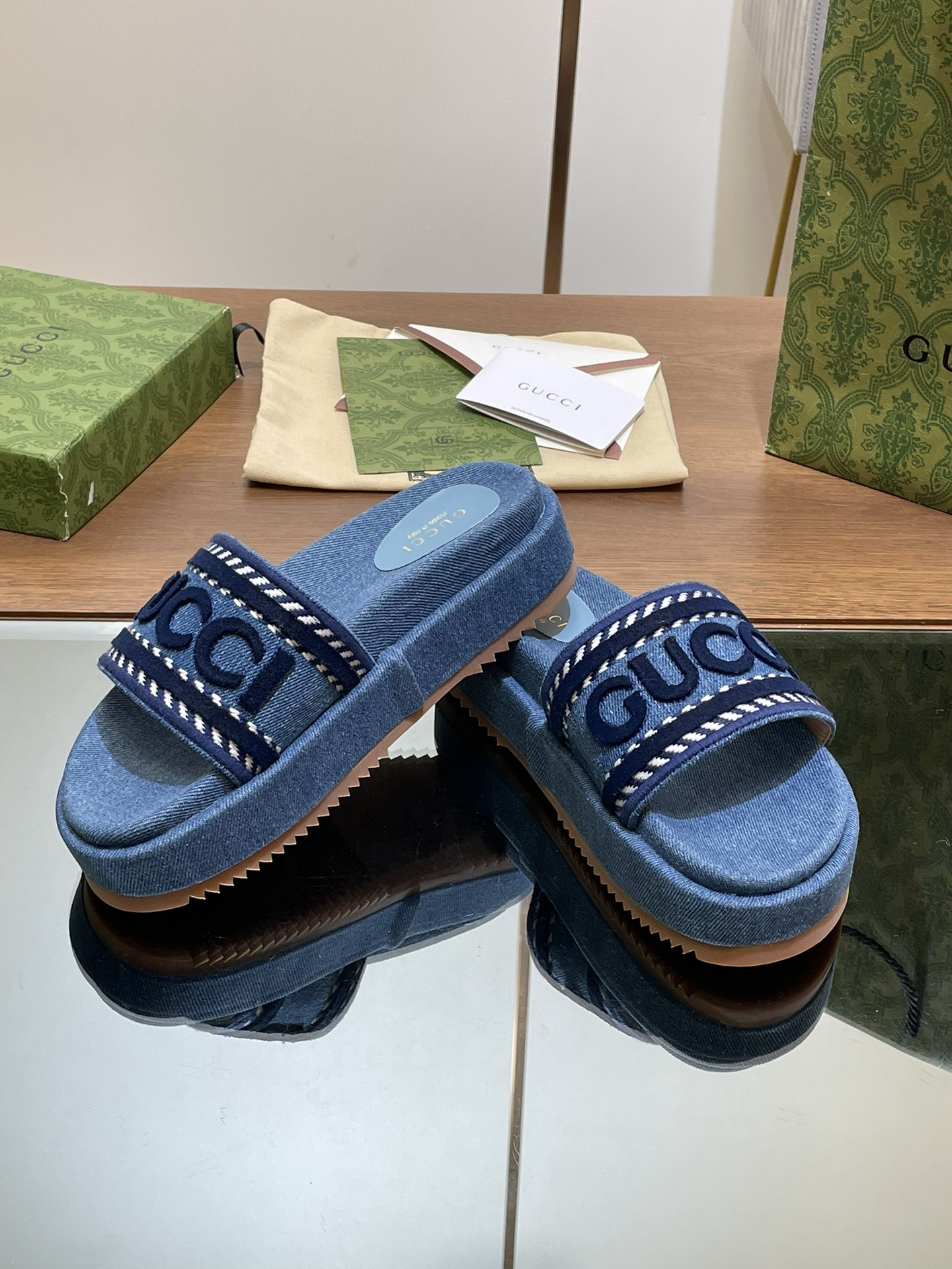 ua G*u*i slide sandal with G*u*i script