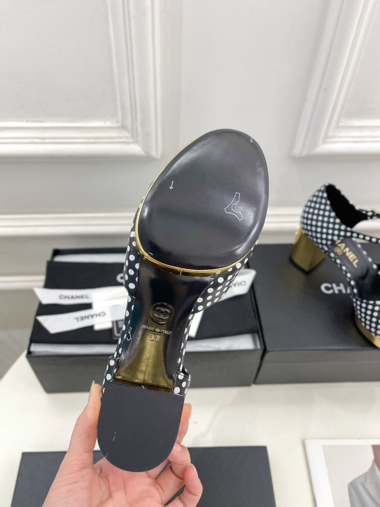 ua Ch*el heeled sandals