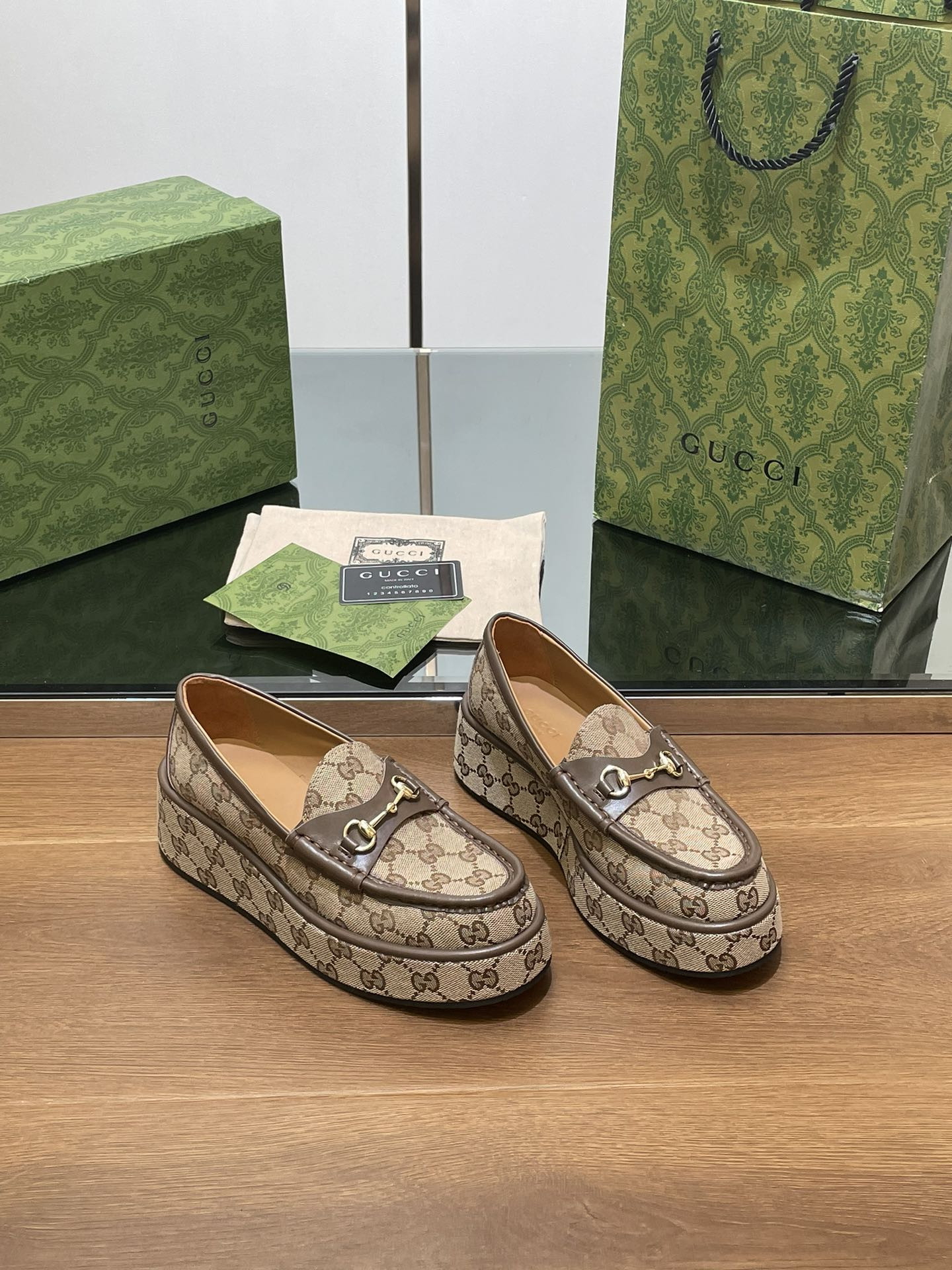 ua G*u*i horsebit wedge loafer