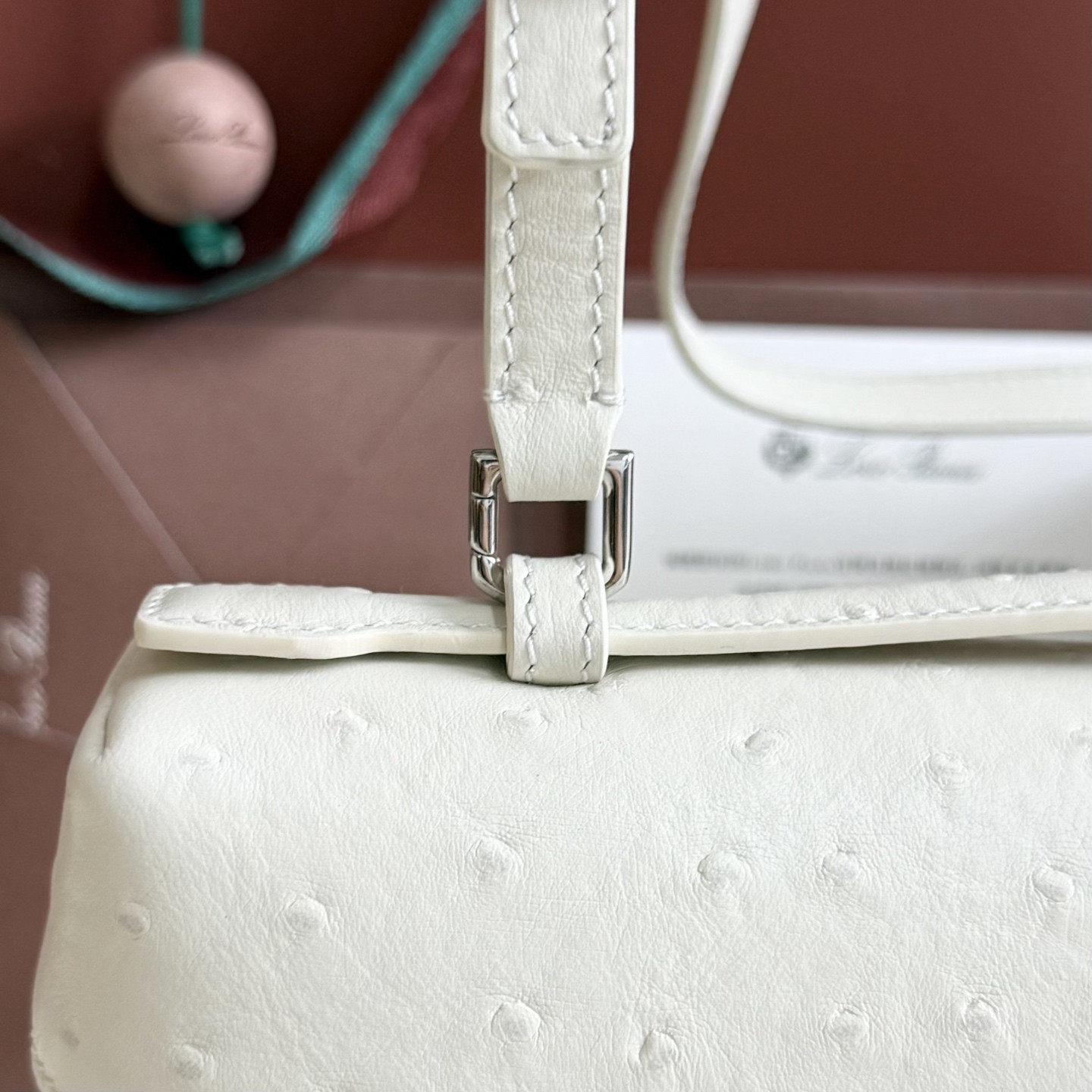 L**o p*ana extra pocket l27 ostrich-grained leather 16x27x10cm